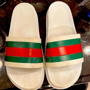80.00 GUCCI SLIDES size 10 worn a dozen times only